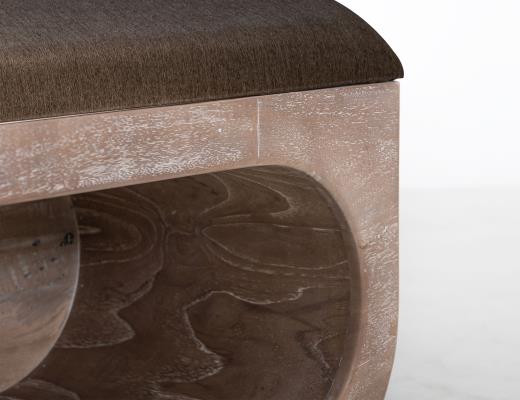 Balam, Wooden bench with a cushioned seat and open storage underneath.