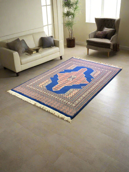 Hand-Knotted Pakistani Wool Rug, Tribal/Floral Design, size 4' 1" x 6' 1"