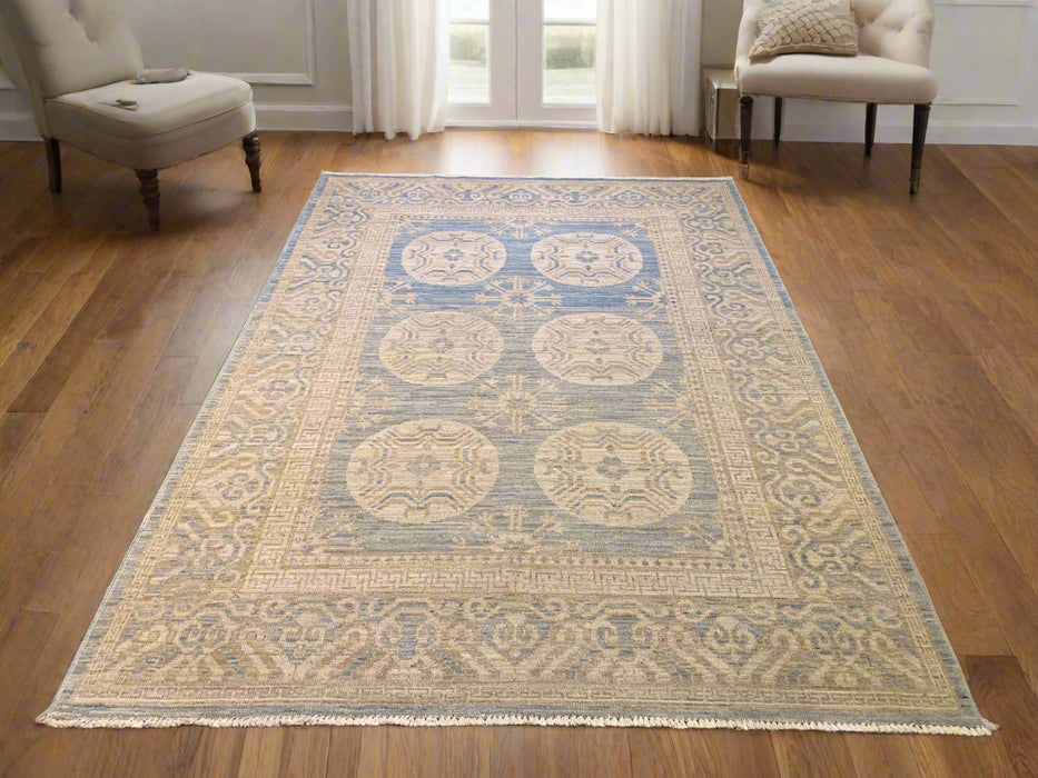 Khotan Pomegranate design Oriental Rug, size 5' 2" x 7"  (D)