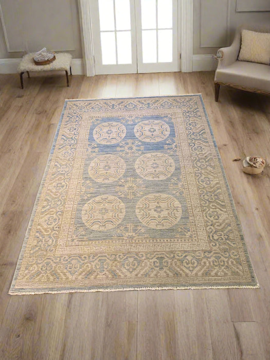 Khotan Pomegranate design Oriental Rug, size 5' 2" x 7"  (D)