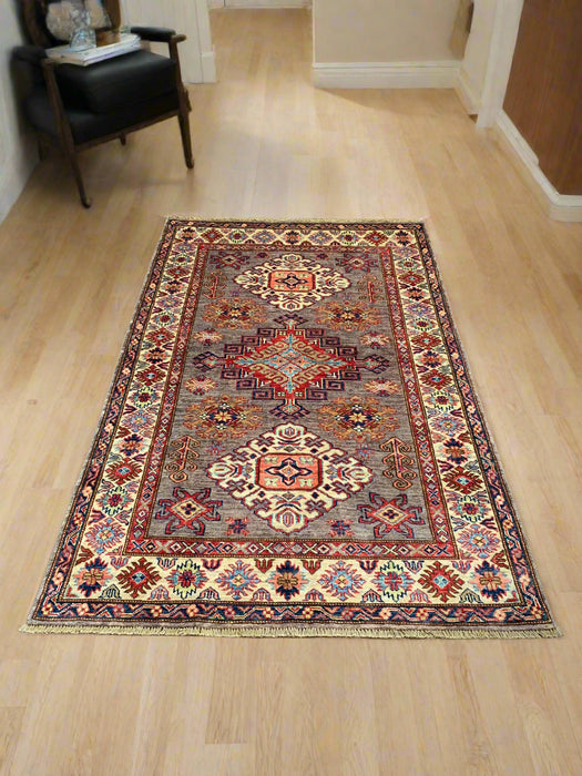 Hand-Knotted Vegetable Dye Kazak Rug from Pakistan, size 4" x 6"