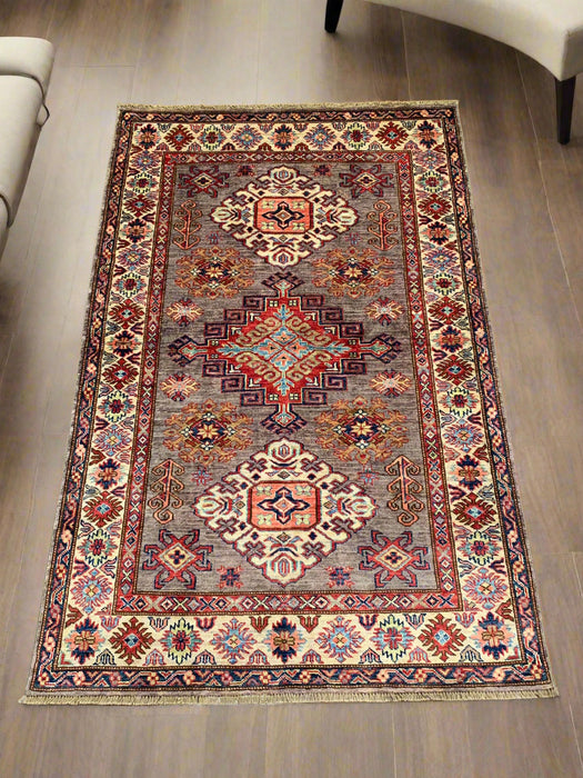 Hand-Knotted Vegetable Dye Kazak Rug from Pakistan, size 4" x 6"
