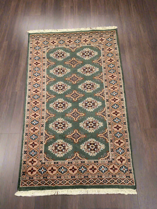 Hand-Knotted Pakistani Wool Rug, Tribal/Floral Design, size 3' 1" x 5' 2" (N)