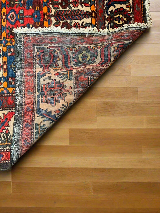Timeless Beauty, Woven by Hand. Antique Persian Bakhtiar Rug, size 5' 3" x 9' 8"