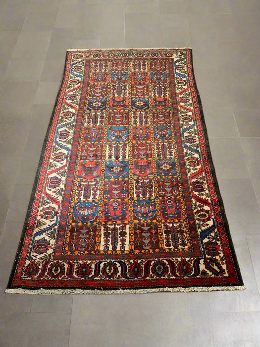 Timeless Beauty, Woven by Hand. Antique Persian Bakhtiar Rug, size 5' 3" x 9' 8"