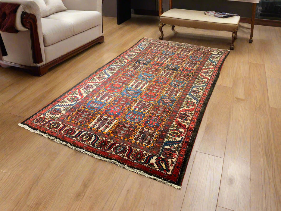 Timeless Beauty, Woven by Hand. Antique Persian Bakhtiar Rug, size 5' 3" x 9' 8"