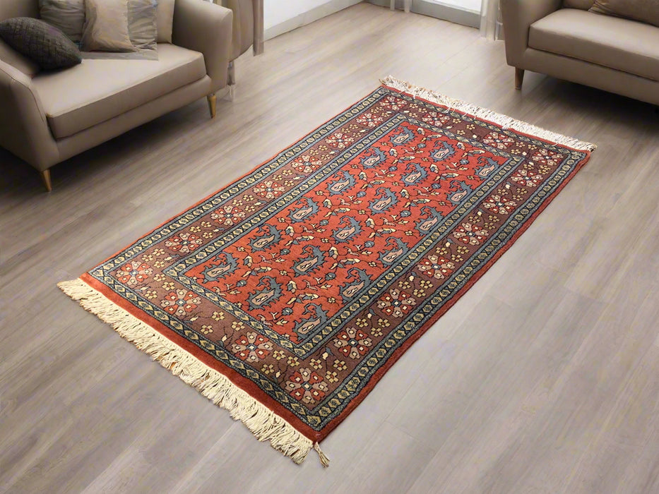 Hand-Knotted Pakistani Wool Rug, Tribal/Floral Design, size 2' 7" x 4' 5"