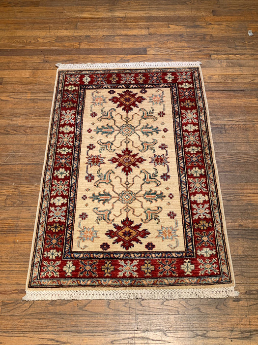 Hand-Knotted Vegetable Dye Kazak Rug from Pakistan, size 2' 9" x 4"