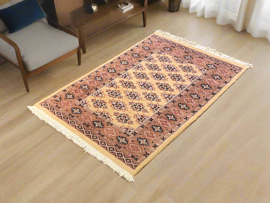 Hand-Knotted Pakistani Wool Rug, Tribal/Floral Design, size 2' 7" x 3' 10"