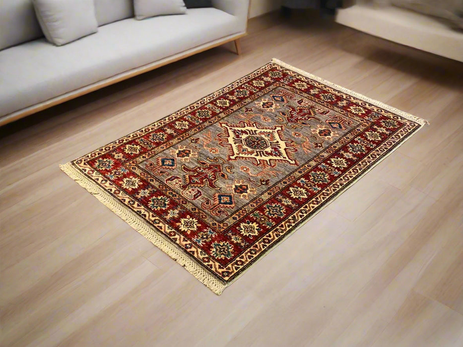 Hand-Knotted Vegetable Dye Kazak Rug from Pakistan, size 2' 10" x 4"