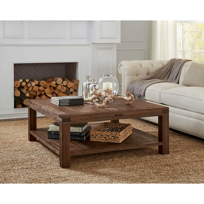 Square Meadow coffee table made of solid wood in brick brown