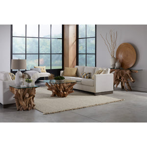 A coffee table made of solid teak wood with a glass top.