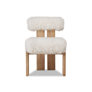 Nia dining chair with sheepskin and lioness accents