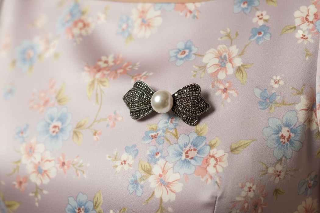 SS Bow pin with marc and faux pearl