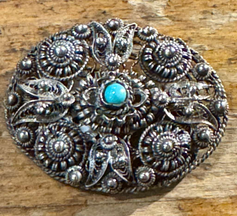 Oval filli with turq pin
