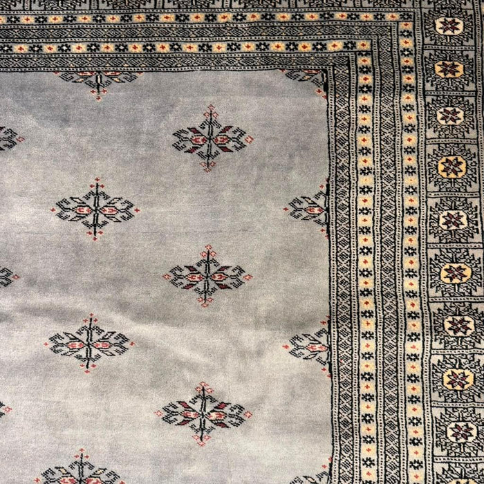 Hand-Knotted Pakistani Bokhara Rug – 100% Wool, size 9' x 12'